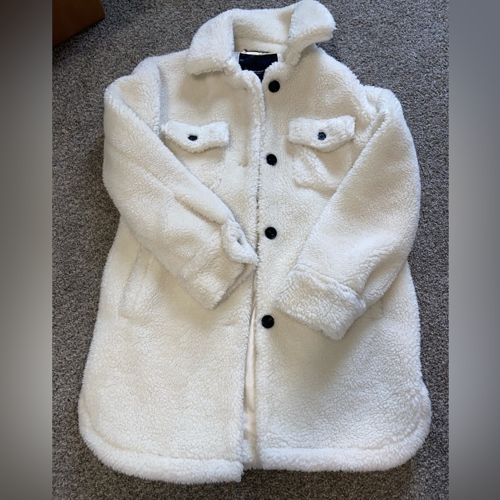 White fuzzy coat